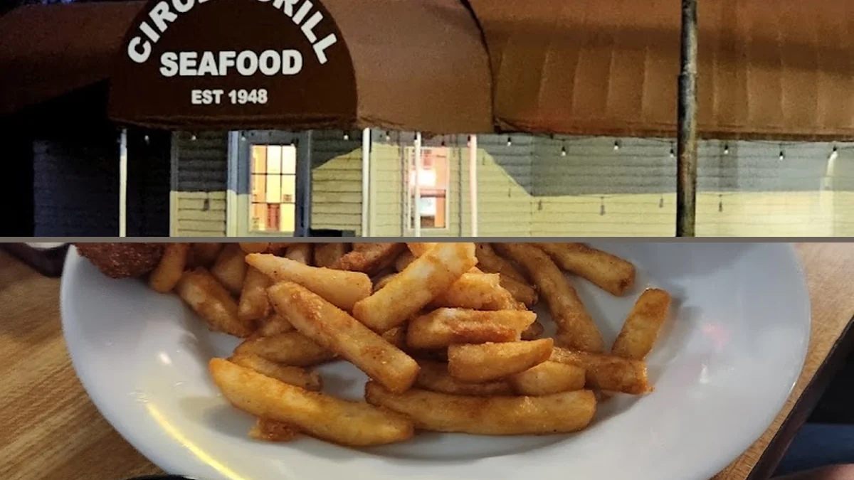 Plates of fried shrimp beside a salad bar.